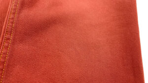 サンセットカラー　デニムパンツ（WOMENS）　ディテールカット１　株式会社DOORS（ドアーズ）